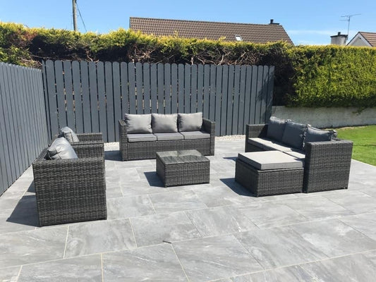 grey rattan furniture with fire pit